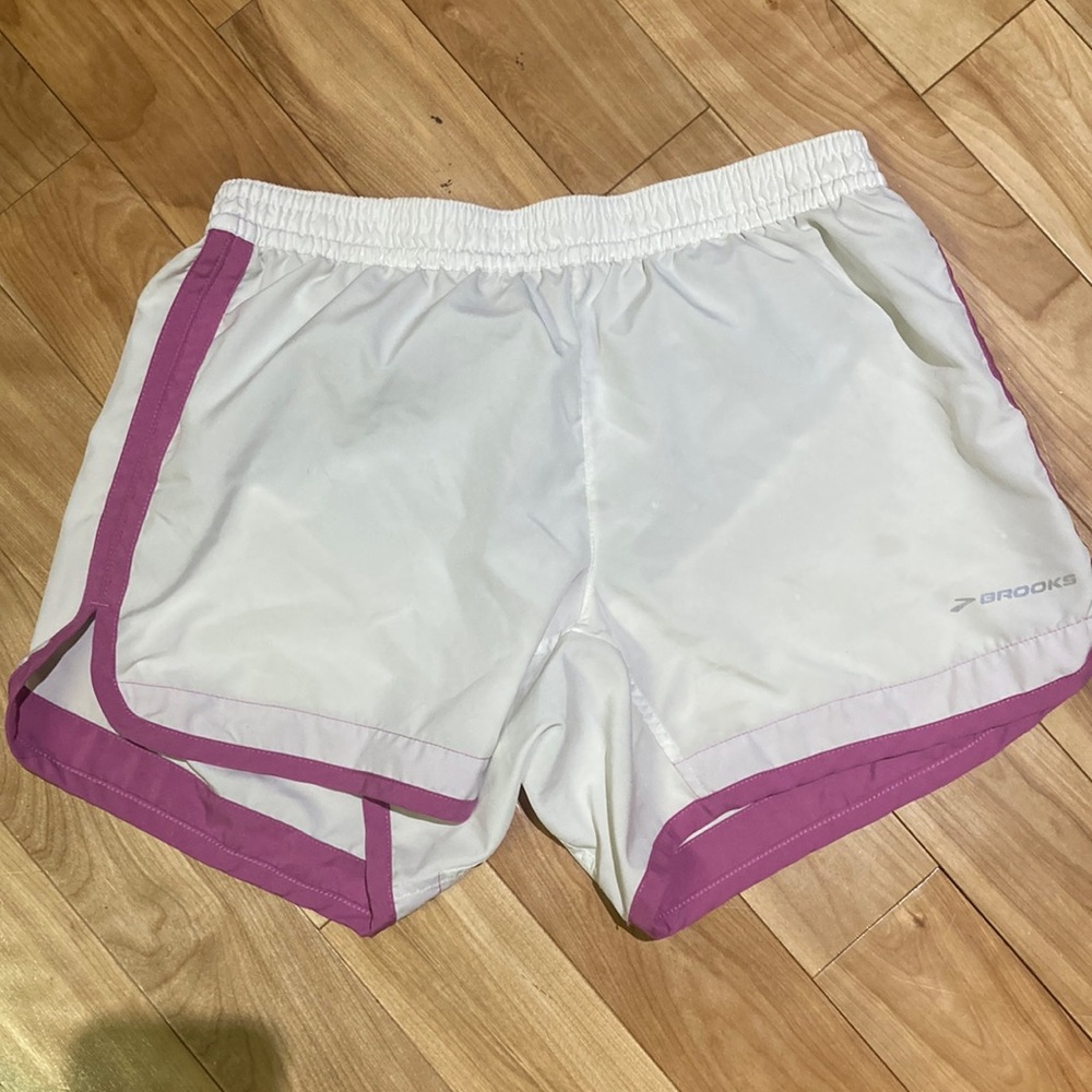 White and pink brooks shorts